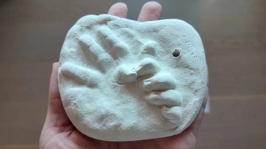 baby handprint made as a keepsake memory at home