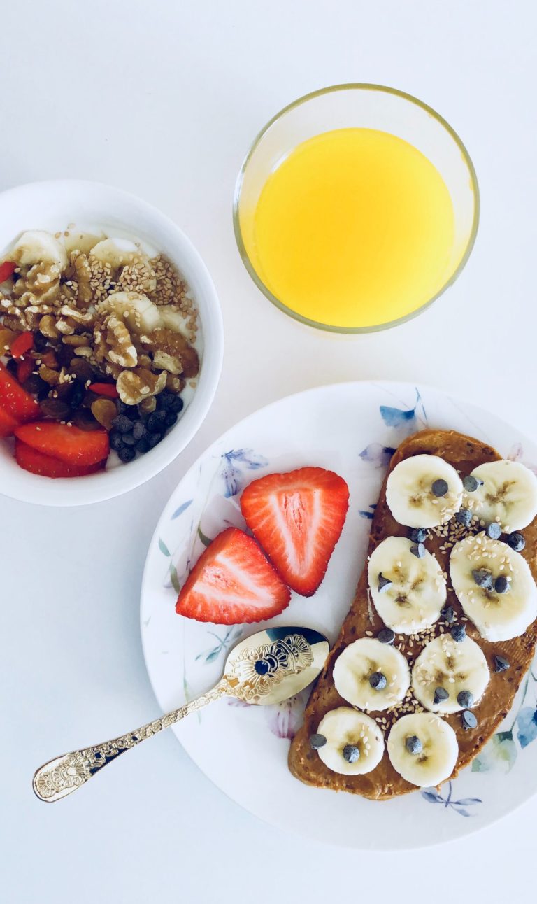 Strawberry Banana Toast: A Burst of Sweetness to Brighten Your Day 4 Healthy breakfast: nut butter banana toast, strawberries, yogurt parfait, and orange juice