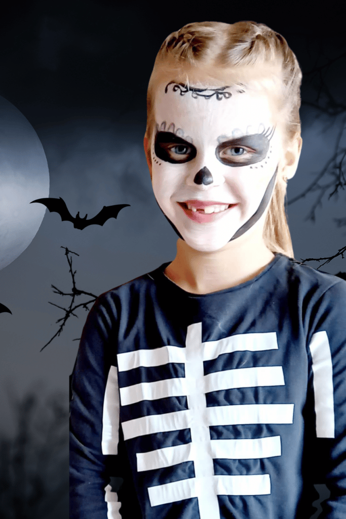 a girl masked in a DIY skeleton costume for Halloween